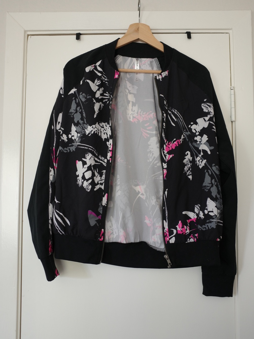 Fabletics Black Bomber Jacket with Pink & White Floral Print